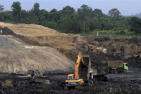 Trucks and machinery are pictured at a PT Exploitasi Energi Indonesia Tbk coal mine at Palaran district in Samarinda, Indonesia east Kaliman Trucks and machinery are pictured at a PT Exploitasi Energi Indonesia Tbk coal mine at Palaran district in Samarinda, Indonesia east Kaliman
