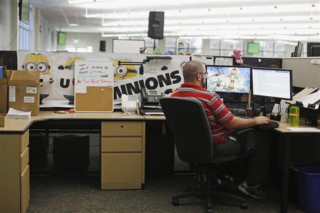 A customer service agent at Covered California's Concord call center works on his computer during the opening day of enrollment of the Patie A customer service agent at Covered California's Concord call center works on his computer during the opening day of enrollment of the Patie