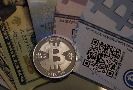 One of Bitcoin enthusiast Mike Caldwell's coins in this photo illustration at his office in Sandy, Utah, September 17, 2013. REUTERS/Jim Urq One of Bitcoin enthusiast Mike Caldwell's coins in this photo illustration at his office in Sandy, Utah, September 17, 2013. REUTERS/Jim Urq