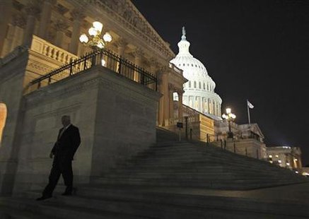 A member of the U.S. House of Representatives walks down the steps from the House Chamber as he exits the U.S. Capitol after the Republican-led House again voted to link funding for the U.S. government to include a delay of ''Obamacare'' in Washington, September 30, 2013.
Credit: Reuters/Jim Bourg A member of the U.S. House of Representatives walks down the steps from the House Chamber as he exits the U.S. Capitol after the Republican-led House again voted to link funding for the U.S. government to include a delay of ''Obamacare'' in Washington, September 30, 2013.
Credit: Reuters/Jim Bourg