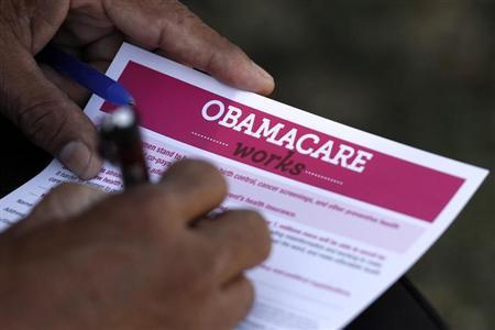 A man fills out an information card during an Affordable Care Act outreach event hosted by Planned Parenthood for the Latino community in Los Angeles, California September 28, 2013. Credit: Reuters/Jonathan Alcorn A man fills out an information card during an Affordable Care Act outreach event hosted by Planned Parenthood for the Latino community in Los Angeles, California September 28, 2013. Credit: Reuters/Jonathan Alcorn