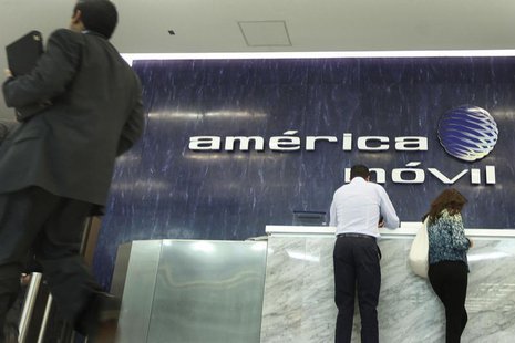 The logo of America Movil is seen on the wall of the reception area in the company's corporate offices in Mexico City February 13, 2013. REU The logo of America Movil is seen on the wall of the reception area in the company's corporate offices in Mexico City February 13, 2013. REU