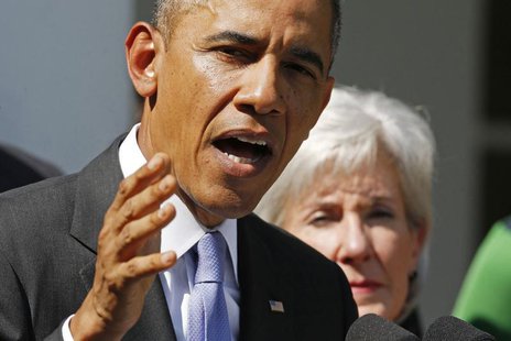U.S. President Barack Obama delivers remarks alongside Human Services Secretary Kathleen Sebelius (R) and other Americans the White House sa U.S. President Barack Obama delivers remarks alongside Human Services Secretary Kathleen Sebelius (R) and other Americans the White House sa