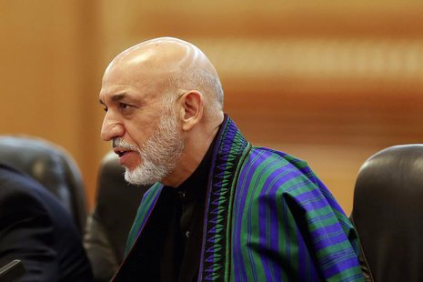 Afghan President Hamid Karzai meets with Chinese President Xi Jinping (not pictured) at the Great Hall of the People in Beijing September 27 Afghan President Hamid Karzai meets with Chinese President Xi Jinping (not pictured) at the Great Hall of the People in Beijing September 27