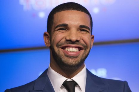 Rapper Drake smiles during an announcement that the Toronto Raptors will host the NBA All-Star game in Toronto, September 30, 2013. REUTERS/ Rapper Drake smiles during an announcement that the Toronto Raptors will host the NBA All-Star game in Toronto, September 30, 2013. REUTERS/