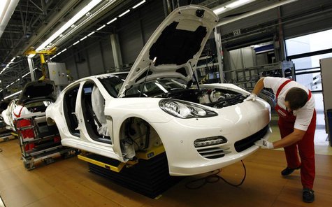A worker works on a Panamera car at the final production unit at the Porsche plant in Leipzig, September 29, 2009. REUTERS/Fabrizio Bensch A worker works on a Panamera car at the final production unit at the Porsche plant in Leipzig, September 29, 2009. REUTERS/Fabrizio Bensch