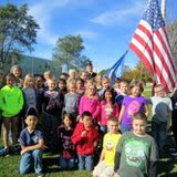 Following the ceremony, Mr. Schuldt poses for a picture with the students of Mrs. Dawn Street. Following the ceremony, Mr. Schuldt poses for a picture with the students of Mrs. Dawn Street.