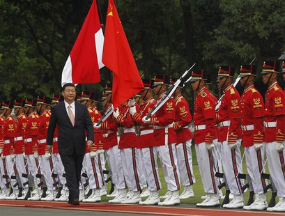 China's President Xi Jinping walks during a welcoming ceremony at the Presidential Palace in Jakarta October 2, 2013. Xi is on a two-day vis China's President Xi Jinping walks during a welcoming ceremony at the Presidential Palace in Jakarta October 2, 2013. Xi is on a two-day vis