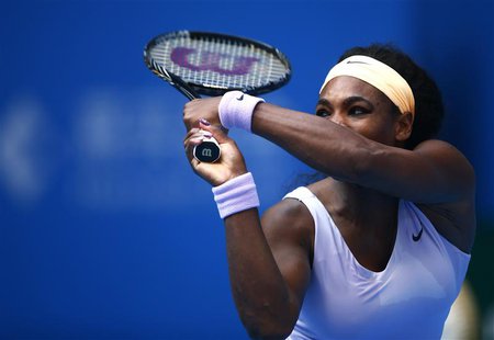 Serena Williams of the U.S. returns the ball during her women's singles match against Maria Kirilenko of Russia at the China Open tennis tou Serena Williams of the U.S. returns the ball during her women's singles match against Maria Kirilenko of Russia at the China Open tennis tou