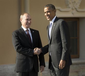U.S. President Barack Obama (R) and Russia's President Vladimir Putin shake hands during arrivals for the G20 summit at the Konstantin Palac U.S. President Barack Obama (R) and Russia's President Vladimir Putin shake hands during arrivals for the G20 summit at the Konstantin Palac