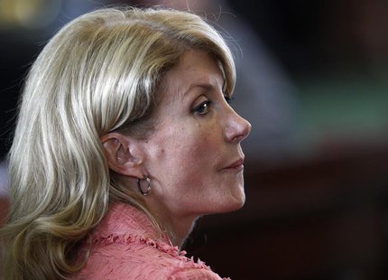 Democratic Senator Wendy Davis listens as the state Senate meets to consider legislation restricting abortion rights in Austin, Texas July 1 Democratic Senator Wendy Davis listens as the state Senate meets to consider legislation restricting abortion rights in Austin, Texas July 1