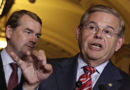 Senate Foreign Relations Committee Chairman Robert Menendez (D-NJ) speaks to the media after the Senate passed the immigration bill on Capit Senate Foreign Relations Committee Chairman Robert Menendez (D-NJ) speaks to the media after the Senate passed the immigration bill on Capit