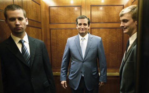 U.S. Senator Ted Cruz (R-TX) (C) departs the Senate floor after a late-night vote rejected budget legislation from the Republican-controlled U.S. Senator Ted Cruz (R-TX) (C) departs the Senate floor after a late-night vote rejected budget legislation from the Republican-controlled