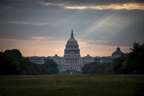 The U.S. Capitol building is seen on Tuesday morning after the federal government was shutdown when the House and Senate failed to pass a bu The U.S. Capitol building is seen on Tuesday morning after the federal government was shutdown when the House and Senate failed to pass a bu
