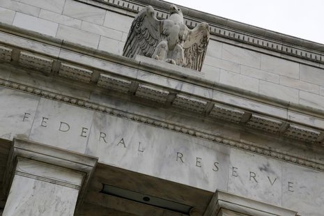 An eagle tops the U.S. Federal Reserve building's facade in Washington, July 31, 2013. REUTERS/Jonathan Ernst An eagle tops the U.S. Federal Reserve building's facade in Washington, July 31, 2013. REUTERS/Jonathan Ernst