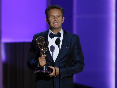 Producer Mark Burnett accepts the award for Outstanding Reality - Competition Program for "The Voice" at the 65th Primetime Emmy Awards in L Producer Mark Burnett accepts the award for Outstanding Reality - Competition Program for "The Voice" at the 65th Primetime Emmy Awards in L