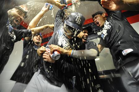 Oct 2, 2013; Cleveland, OH, USA; Tampa Bay Rays starting pitcher Alex Cobb (center) celebrates with pitcher David Price (second right) teammates after defeating the Cleveland Indians in the American League wild card playoff game at Progressive Field. Tampa Bay won 4-0. Mandatory Credit: David Richard-USA TODAY Sports Oct 2, 2013; Cleveland, OH, USA; Tampa Bay Rays starting pitcher Alex Cobb (center) celebrates with pitcher David Price (second right) teammates after defeating the Cleveland Indians in the American League wild card playoff game at Progressive Field. Tampa Bay won 4-0. Mandatory Credit: David Richard-USA TODAY Sports