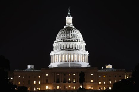 A view of the U.S. Capitol at night, on the eve of a potential federal government shutdown, in Washington September 30, 2013. REUTERS/Kevin A view of the U.S. Capitol at night, on the eve of a potential federal government shutdown, in Washington September 30, 2013. REUTERS/Kevin
