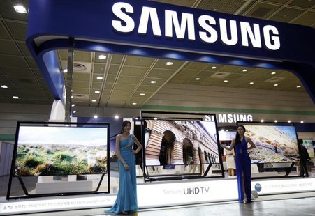 Models pose with Samsung Electronics' Ultra HD LCD televisions during World IT show 2013 at the Coex convention centre in Seoul May 22, 2013 Models pose with Samsung Electronics' Ultra HD LCD televisions during World IT show 2013 at the Coex convention centre in Seoul May 22, 2013
