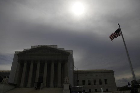 The sun shines through cloud cover above the U.S. Supreme Court building in Washington, June 13, 2013. REUTERS/Jonathan Ernst The sun shines through cloud cover above the U.S. Supreme Court building in Washington, June 13, 2013. REUTERS/Jonathan Ernst