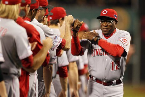 Oct 1, 2013; Pittsburgh, PA, USA; Cincinnati Reds manager Dusty Baker (12) is introduced before National League wild card playoff baseball g Oct 1, 2013; Pittsburgh, PA, USA; Cincinnati Reds manager Dusty Baker (12) is introduced before National League wild card playoff baseball g