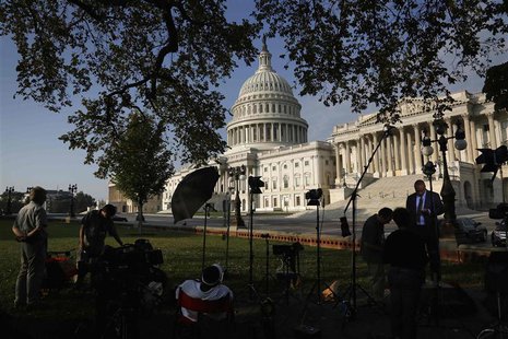 Television news crews set up outside the U.S. Capitol in Washington, October 4, 2013. REUTERS/Jonathan Ernst Television news crews set up outside the U.S. Capitol in Washington, October 4, 2013. REUTERS/Jonathan Ernst