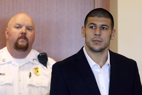 Aaron Hernandez, former player for the NFL's New England Patriots football team, stands during his arraignment in the Bristol County Superio Aaron Hernandez, former player for the NFL's New England Patriots football team, stands during his arraignment in the Bristol County Superio