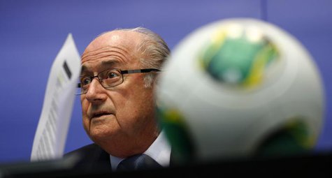 FIFA President Sepp Blatter adjusts his glasses as he addresses the media after a meeting of the executive committee in Zurich October 4, 20 FIFA President Sepp Blatter adjusts his glasses as he addresses the media after a meeting of the executive committee in Zurich October 4, 20