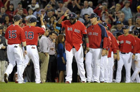 Oct 4, 2013; Boston, MA, USA; Members of the Boston Red Sox including David Ortiz (middle) celebrate after defeating the Tampa Bay Rays in g Oct 4, 2013; Boston, MA, USA; Members of the Boston Red Sox including David Ortiz (middle) celebrate after defeating the Tampa Bay Rays in g