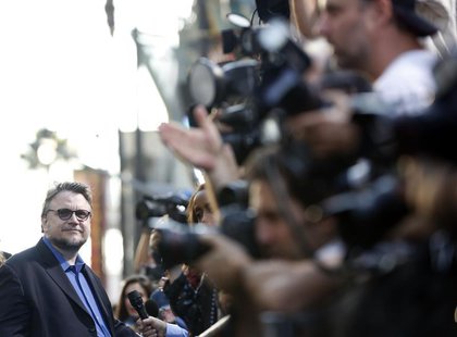 Director Guillermo del Toro is interviewed at the premiere of "Pacific Rim" at Dolby theatre in Hollywood, California July 9, 2013. REUTERS/ Director Guillermo del Toro is interviewed at the premiere of "Pacific Rim" at Dolby theatre in Hollywood, California July 9, 2013. REUTERS/