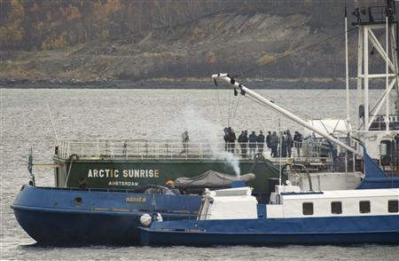 Captain Peter Willcox (5th R), an American, captained the Arctic Sunrise during a protest near the Prirazlomnaya oil platform, and federal Investigative Committee employees and Interior Ministry members are seen onboard the Arctic Sunrise vessel anchored outside the Arctic port city of Murmansk, in this October 2, 2013 handout provided by Greenpeace.
REUTERS/Dmitri Sharomov/Greenpeace/Handout via Reuters Captain Peter Willcox (5th R), an American, captained the Arctic Sunrise during a protest near the Prirazlomnaya oil platform, and federal Investigative Committee employees and Interior Ministry members are seen onboard the Arctic Sunrise vessel anchored outside the Arctic port city of Murmansk, in this October 2, 2013 handout provided by Greenpeace.
REUTERS/Dmitri Sharomov/Greenpeace/Handout via Reuters