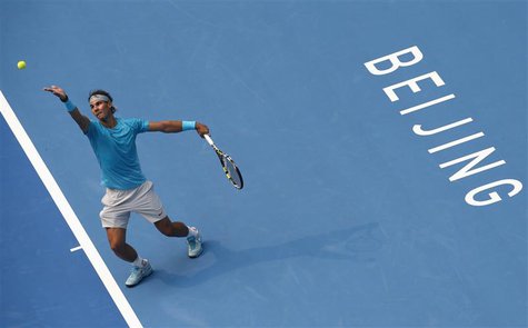 Spain's Rafael Nadal serves during his men's singles semi-final match against Tomas Berdych of the Czech Republic at the China Open tennis t Spain's Rafael Nadal serves during his men's singles semi-final match against Tomas Berdych of the Czech Republic at the China Open tennis t