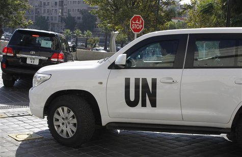 U.N. vehicles transport a team of experts from the Organisation for the Prohibition of Chemical Weapons as they leave their hotel in Damascu U.N. vehicles transport a team of experts from the Organisation for the Prohibition of Chemical Weapons as they leave their hotel in Damascu