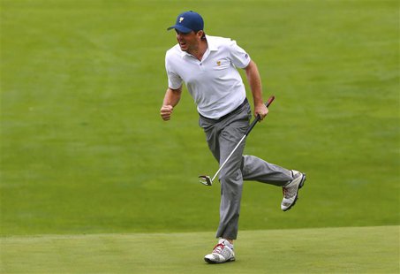 Keegan Bradley of the U.S. celebrates after sinking his putt on the 18th hole while playing Justin Day of Australia and Graham DeLaet of Can Keegan Bradley of the U.S. celebrates after sinking his putt on the 18th hole while playing Justin Day of Australia and Graham DeLaet of Can