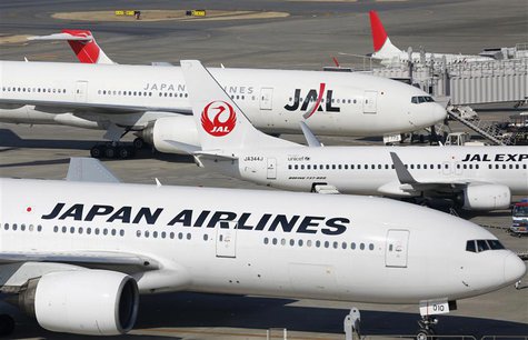 Japan Airlines aircrafts are parked on the tarmac at Haneda Airport in Tokyo February 4, 2013. REUTERS/Toru Hanai Japan Airlines aircrafts are parked on the tarmac at Haneda Airport in Tokyo February 4, 2013. REUTERS/Toru Hanai