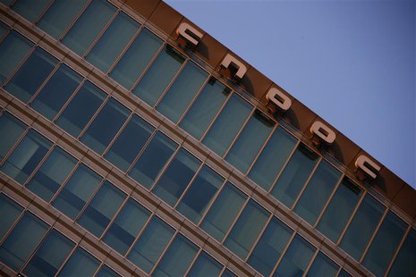 A logo of China National Offshore Oil Corp (CNOOC) is seen at the top of its headquarters in Beijing November 14, 2012. REUTERS/Petar Kujund A logo of China National Offshore Oil Corp (CNOOC) is seen at the top of its headquarters in Beijing November 14, 2012. REUTERS/Petar Kujund