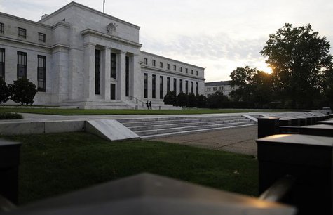 The sun rises to the east of the U.S. Federal Reserve building in Washington, July 31, 2013. REUTERS/Jonathan Ernst The sun rises to the east of the U.S. Federal Reserve building in Washington, July 31, 2013. REUTERS/Jonathan Ernst
