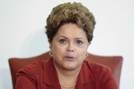 Brazil's President Dilma Rousseff reacts during a meeting with Andreas Renschler, head of production and procurement at Mercedes-Benz Cars, Brazil's President Dilma Rousseff reacts during a meeting with Andreas Renschler, head of production and procurement at Mercedes-Benz Cars,
