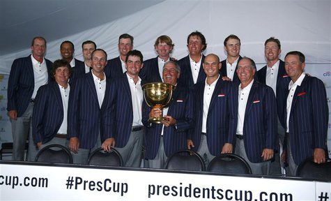 U.S. team captain Fred Couples holds the Presidents Cup during a team picture after the U.S. defeated the International team in the 2013 Pre U.S. team captain Fred Couples holds the Presidents Cup during a team picture after the U.S. defeated the International team in the 2013 Pre