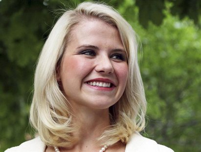 Elizabeth Smart talks to the media outside the Federal Courthouse after addressing her kidnapper, Brian David Mitchell, during his sentencin Elizabeth Smart talks to the media outside the Federal Courthouse after addressing her kidnapper, Brian David Mitchell, during his sentencin