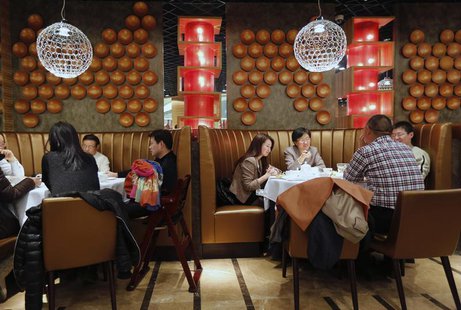 People have dinner at a fine restaurant in Beijing February 21, 2013. REUTERS/Kim Kyung-Hoon People have dinner at a fine restaurant in Beijing February 21, 2013. REUTERS/Kim Kyung-Hoon