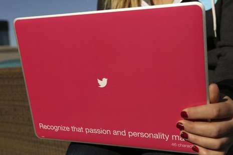 A Twitter logo is shown on a laptop computer at the company's headquarters in San Francisco, California October 4, 2013. REUTERS/Robert Galb A Twitter logo is shown on a laptop computer at the company's headquarters in San Francisco, California October 4, 2013. REUTERS/Robert Galb
