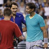 Roger Federer of Switzerland and Rafael Nadal (R) of Spain greet each other at the net after Nadal defeated Federer in their men's singles q Roger Federer of Switzerland and Rafael Nadal (R) of Spain greet each other at the net after Nadal defeated Federer in their men's singles q