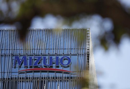 A logo of Mizuho bank, belonging to Mizuho Financial Group, is seen at its branch in Tokyo January 29, 2013. REUTERS/Shohei Miyano A logo of Mizuho bank, belonging to Mizuho Financial Group, is seen at its branch in Tokyo January 29, 2013. REUTERS/Shohei Miyano