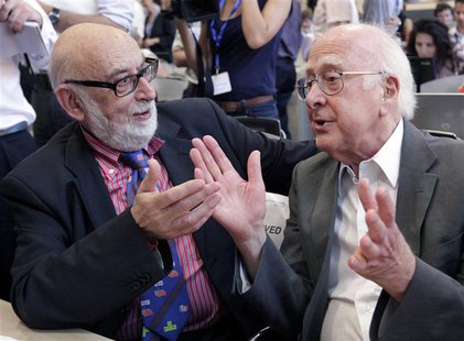 File picture of British physicist Peter Higgs (R) talking with Belgium physicist Francois Englert before a news conference on the search for File picture of British physicist Peter Higgs (R) talking with Belgium physicist Francois Englert before a news conference on the search for