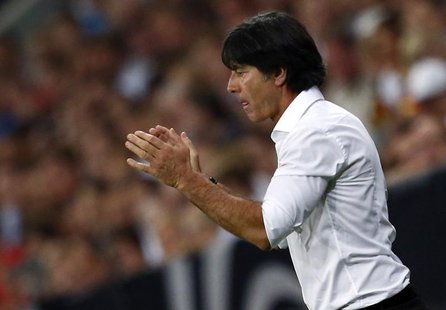 Germany's coach Joachim Loew gestures during their 2014 World Cup qualifying soccer match against Austria in Munich September 6, 2013. REUTE Germany's coach Joachim Loew gestures during their 2014 World Cup qualifying soccer match against Austria in Munich September 6, 2013. REUTE