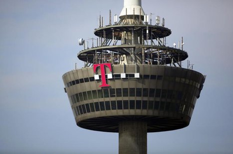 The logo of Deutsche Telekom is pictured on the 266 metre high "Colonia" TV tower in the western German city of Cologne March 25, 2013. REUT The logo of Deutsche Telekom is pictured on the 266 metre high "Colonia" TV tower in the western German city of Cologne March 25, 2013. REUT