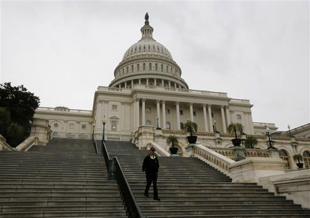A U.S. Capitol police officer walks down the West Front steps of the U.S. Capitol in Washington October 7, 2013. REUTERS/Jason Reed A U.S. Capitol police officer walks down the West Front steps of the U.S. Capitol in Washington October 7, 2013. REUTERS/Jason Reed