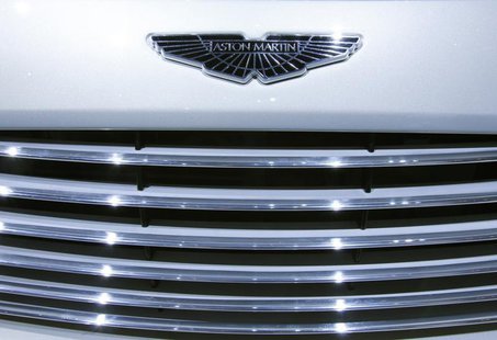 The emblem on the grille of the new Aston Martin Cygnet car is displayed on the exhibition stand of Aston Martin during the first media day The emblem on the grille of the new Aston Martin Cygnet car is displayed on the exhibition stand of Aston Martin during the first media day