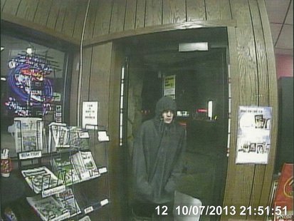 Surveillance photo of attempted robbery suspect at Lang Oil Gas Station in Oshkosh. Surveillance photo of attempted robbery suspect at Lang Oil Gas Station in Oshkosh.